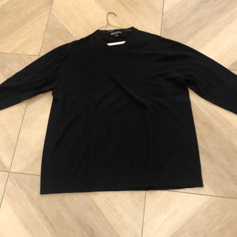 Long sleeve solid black light  sweater.
